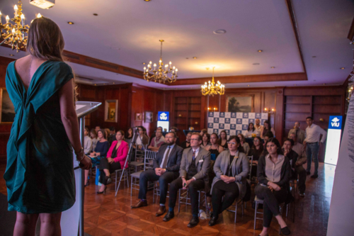 presentation_image A woman making a presentation at a hotel venue